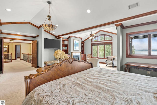 6853 S W Bay Shore Dr, Traverse City, MI 49684 - carpeted bedroom featuring lofted ceiling, crown molding, recessed lighting, baseboards, and a fireplace