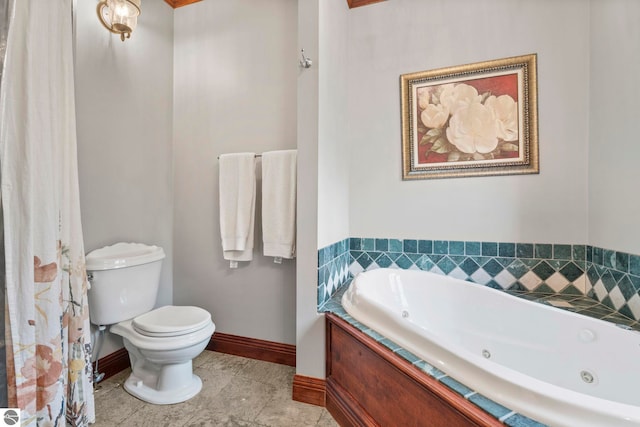 6853 S W Bay Shore Dr, Traverse City, MI 49684 - full bath with a jetted tub, toilet, and baseboards