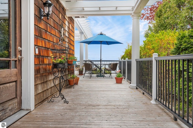 6853 S W Bay Shore Dr, Traverse City, MI 49684 - deck featuring outdoor dining space