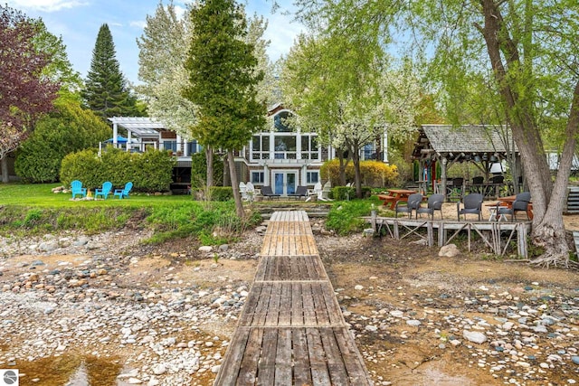 6853 S W Bay Shore Dr, Traverse City, MI 49684 - back of house with a pergola and a gazebo