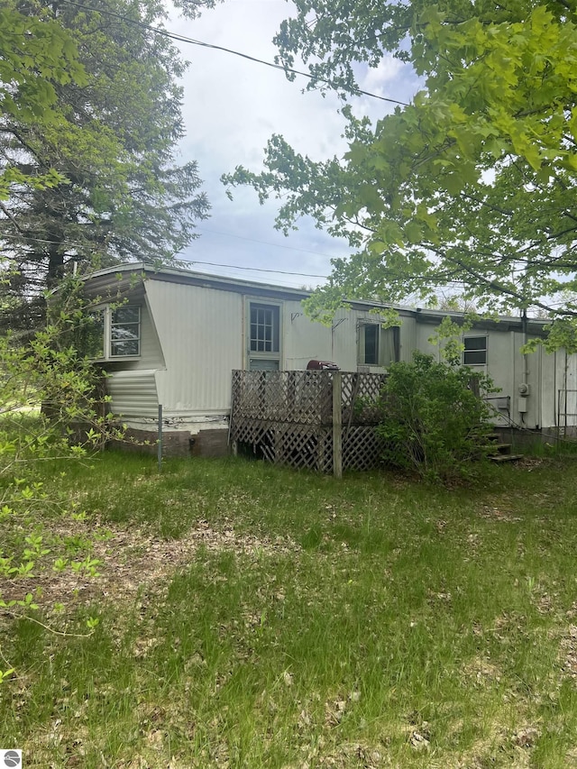 8713 Kingsley Rd, Kingsley, MI 49649 - view of rear view of house