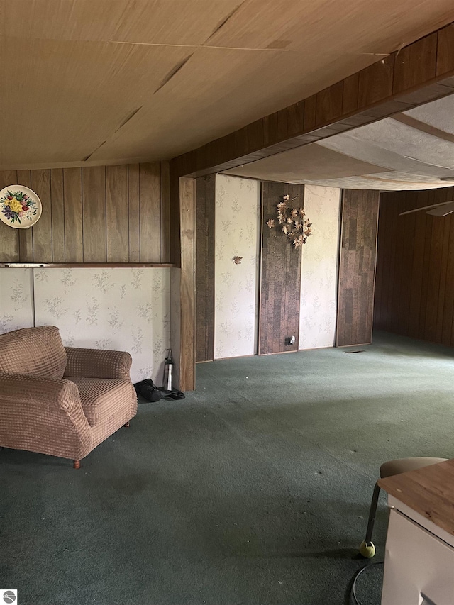 8713 Kingsley Rd, Kingsley, MI 49649 - sitting room with carpet floors and wood walls