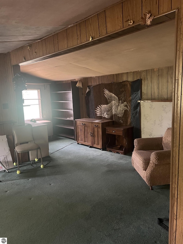 8713 Kingsley Rd, Kingsley, MI 49649 - carpeted living area featuring wooden walls