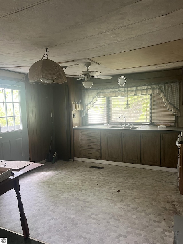 8713 Kingsley Rd, Kingsley, MI 49649 - kitchen with a sink and a ceiling fan