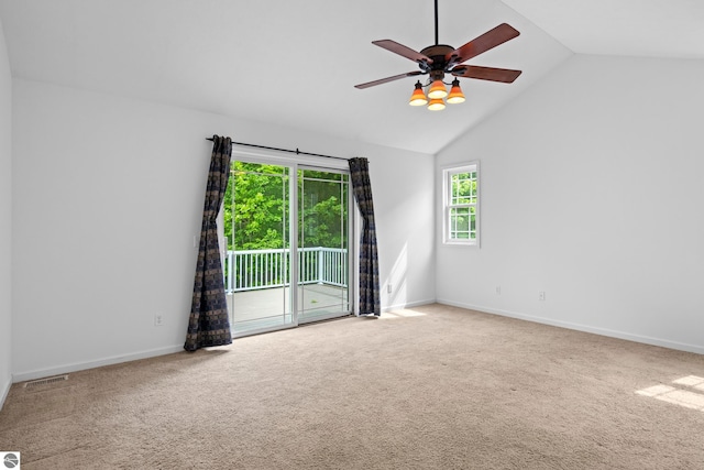 5151 Hidden Gables Dr, Traverse City, MI 49684 - carpeted spare room with a ceiling fan and lofted ceiling