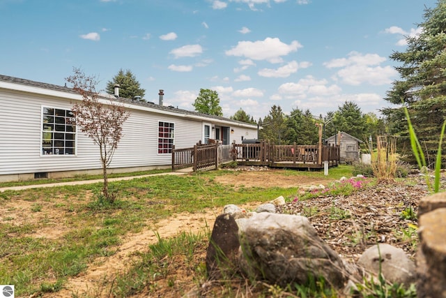 9170 Townline Rd, Kingsley, MI 49649 - view of grassy yard featuring a wooden deck