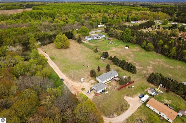 9170 Townline Rd, Kingsley, MI 49649 - aerial overview of property's location featuring a heavily wooded area and rural landscape