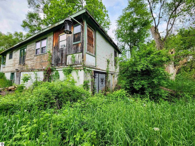 18846 Maple St, Copemish, MI 49625 - view of side of home
