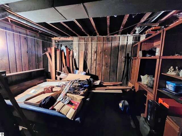 18846 Maple St, Copemish, MI 49625 - unfinished below grade area featuring wooden walls