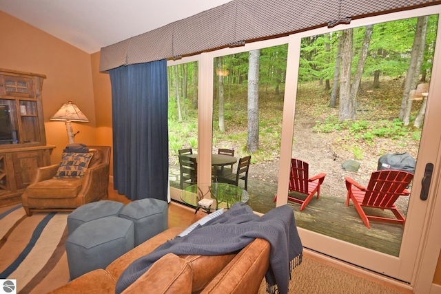 4365 W Burdickville Rd, Maple City, MI 49664 - carpeted living room with vaulted ceiling