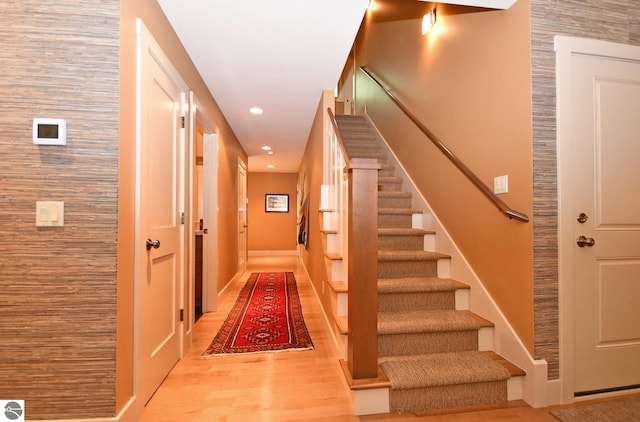 4365 W Burdickville Rd, Maple City, MI 49664 - stairway featuring recessed lighting, wood finished floors, and baseboards