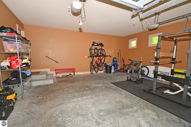 4365 W Burdickville Rd, Maple City, MI 49664 - garage with a garage door opener