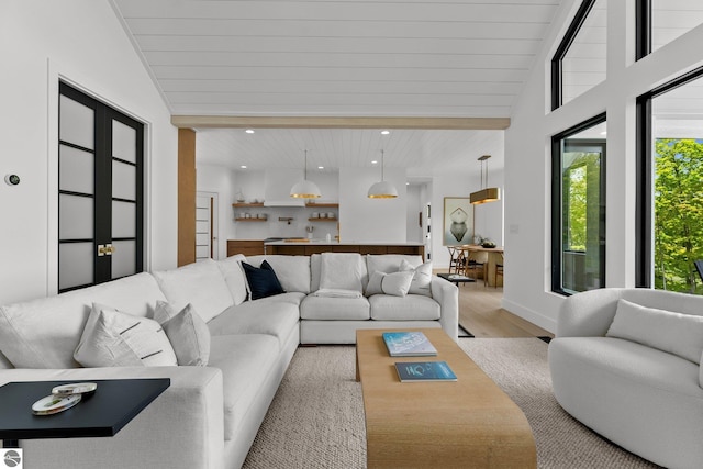 6848 S Carol Ann Dr, Traverse City, MI 49684 - living room featuring light wood-style floors, lofted ceiling, recessed lighting, and wooden ceiling