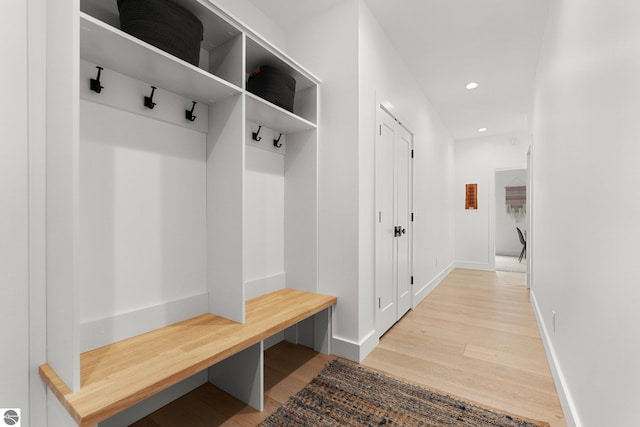 6848 S Carol Ann Dr, Traverse City, MI 49684 - mudroom with light wood-style floors, recessed lighting, and baseboards