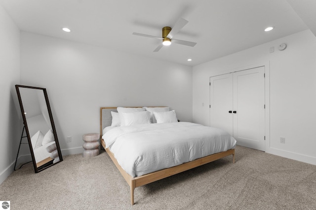 6848 S Carol Ann Dr, Traverse City, MI 49684 - bedroom with carpet, recessed lighting, ceiling fan, and baseboards