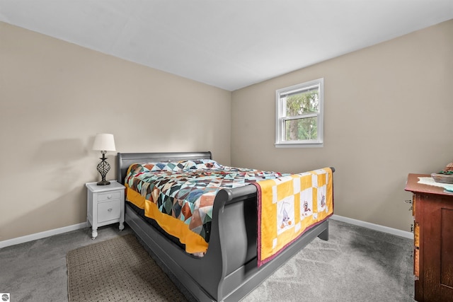 6148 S 27th Rd, Cadillac, MI 49601 - bedroom with carpet floors and baseboards