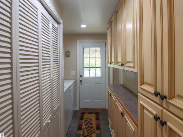 8086 Narrow Gauge Rd, Beulah, MI 49617 - doorway to outside featuring independent washer and dryer and recessed lighting