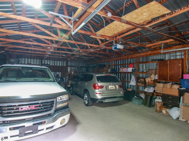 8086 Narrow Gauge Rd, Beulah, MI 49617 - garage with a garage door opener