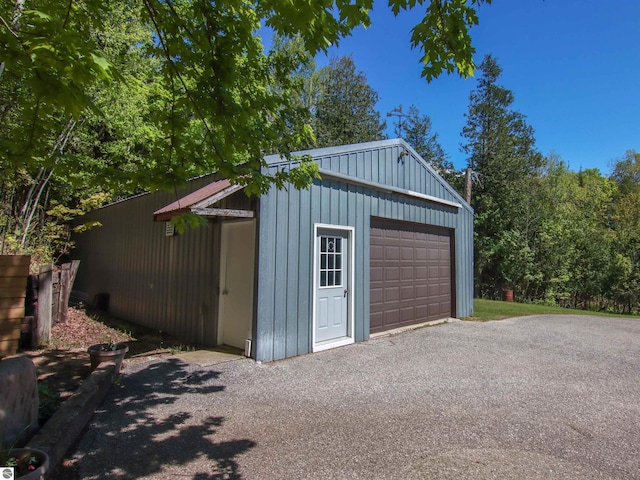 8086 Narrow Gauge Rd, Beulah, MI 49617 - detached garage featuring driveway