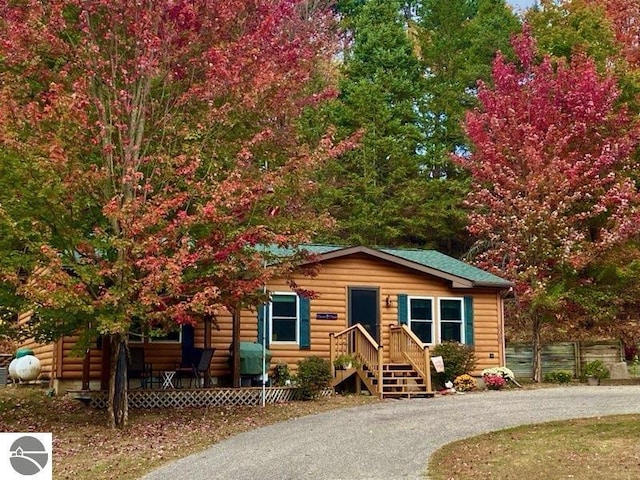 8086 Narrow Gauge Rd, Beulah, MI 49617 - view of front of property featuring driveway