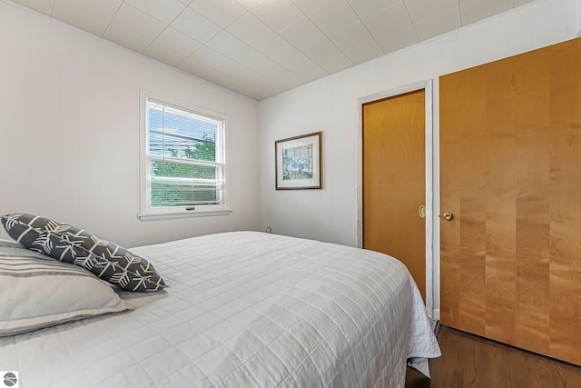 7510 Crystal Dr, Beulah, MI 49616 - bedroom with wood finished floors