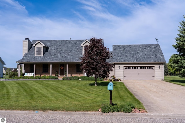 2152 Cornerstone Dr, Mount Pleasant, MI 48858 - cape cod home featuring a chimney, a front lawn, driveway, and covered porch