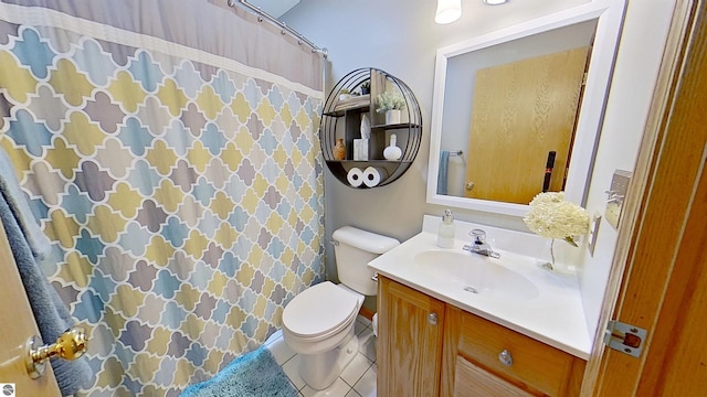 2152 Cornerstone Dr, Mount Pleasant, MI 48858 - full bath with vanity, toilet, tile patterned floors, and a shower with curtain