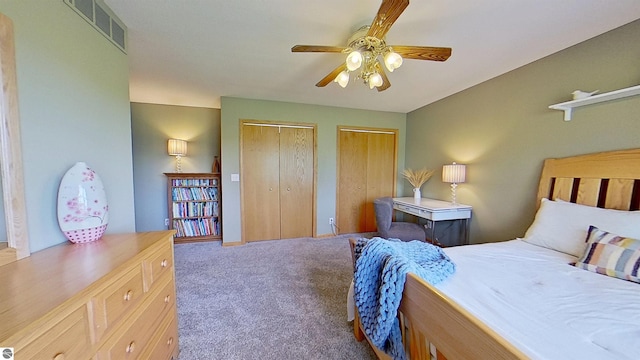 2152 Cornerstone Dr, Mount Pleasant, MI 48858 - bedroom with two closets, carpet floors, and ceiling fan