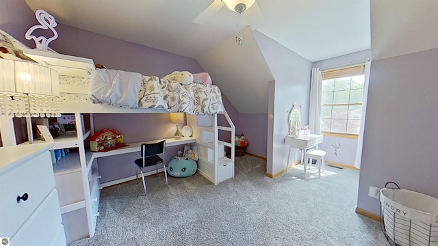 2152 Cornerstone Dr, Mount Pleasant, MI 48858 - carpeted bedroom with vaulted ceiling, an office area, baseboards, and a ceiling fan