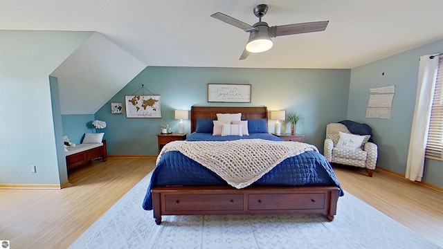 2152 Cornerstone Dr, Mount Pleasant, MI 48858 - bedroom with light wood-style floors, a ceiling fan, baseboards, and vaulted ceiling