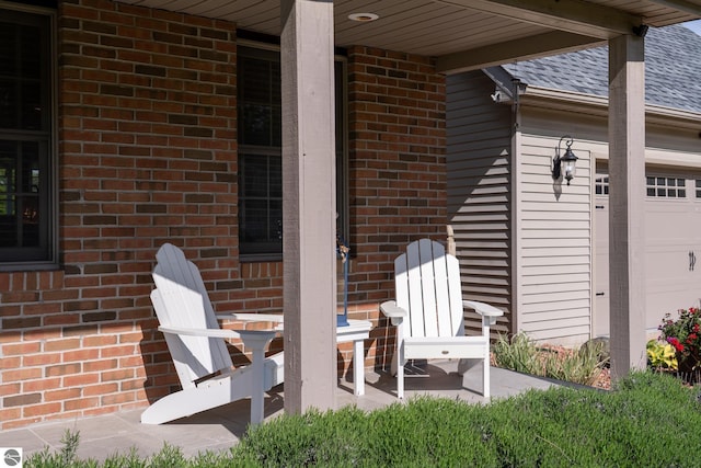 2152 Cornerstone Dr, Mount Pleasant, MI 48858 - view of patio / terrace with an attached garage