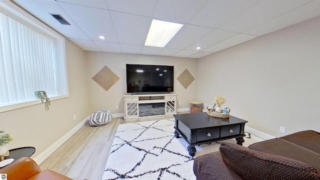 2152 Cornerstone Dr, Mount Pleasant, MI 48858 - living room with wood finished floors, baseboards, recessed lighting, and a drop ceiling