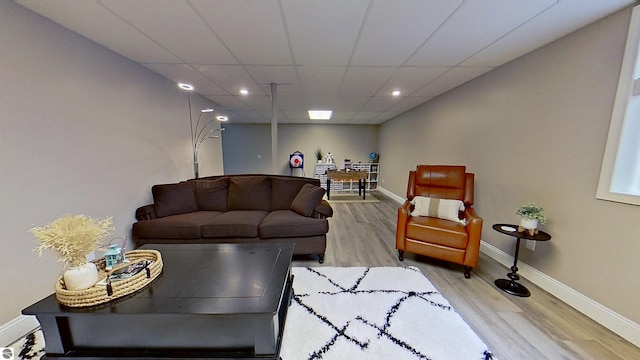 2152 Cornerstone Dr, Mount Pleasant, MI 48858 - living area featuring baseboards, wood finished floors, recessed lighting, and a paneled ceiling