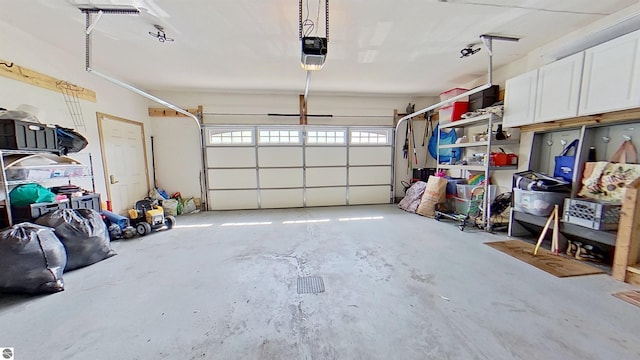 2152 Cornerstone Dr, Mount Pleasant, MI 48858 - garage featuring a garage door opener