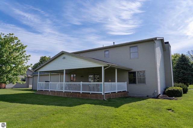 2152 Cornerstone Dr, Mount Pleasant, MI 48858 - view of front of home featuring a front lawn, a porch, and a chimney