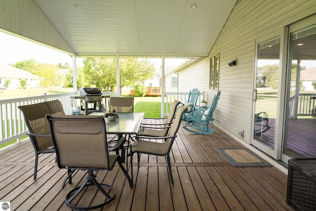 2152 Cornerstone Dr, Mount Pleasant, MI 48858 - deck with outdoor dining area and a grill