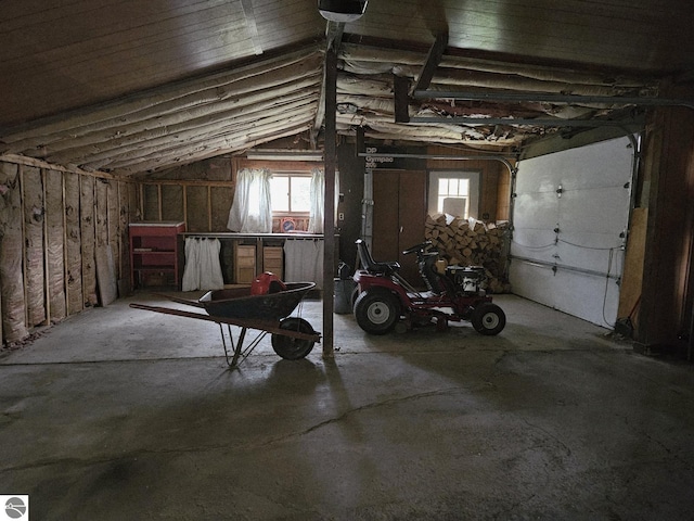 4451 Bissonette Rd, Oscoda, MI 48750 - garage featuring a garage door opener