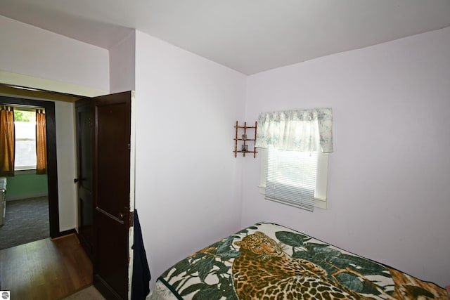 4327 S M-65, Glennie, MI 48737 - bedroom featuring wood finished floors