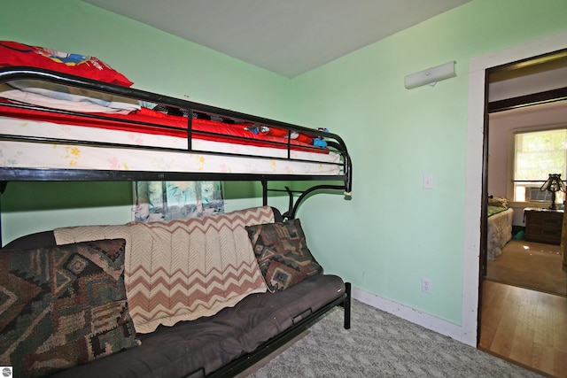 4327 S M-65, Glennie, MI 48737 - bedroom featuring baseboards and carpet