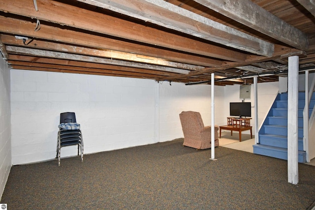 4327 S M-65, Glennie, MI 48737 - basement with electric panel, stairway, carpet flooring, and concrete block wall