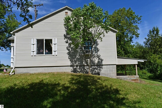 4327 S M-65, Glennie, MI 48737 - view of side of property with a yard
