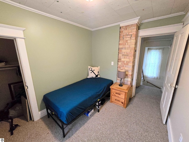 820 Wallace St, Cadillac, MI 49601 - carpeted bedroom with ornamental molding