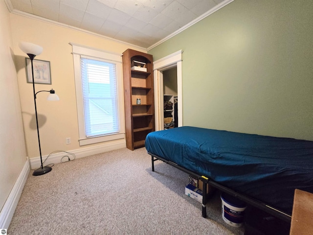 820 Wallace St, Cadillac, MI 49601 - carpeted bedroom with crown molding and baseboards