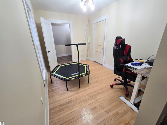 820 Wallace St, Cadillac, MI 49601 - office space featuring hardwood / wood-style floors and baseboards