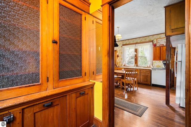 9889 Ramsay Rd, Buckley, MI 49620 - hall with wood finished floors and a textured ceiling