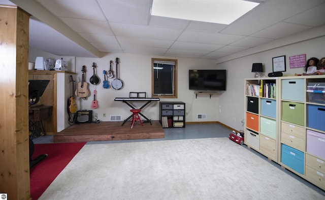 10226 Deerpath N, Traverse City, MI 49685 - game room featuring a paneled ceiling, carpet, and baseboards