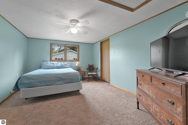 217 Winona Pl, Cadillac, MI 49601 - bedroom with light colored carpet, a textured ceiling, baseboards, and ceiling fan