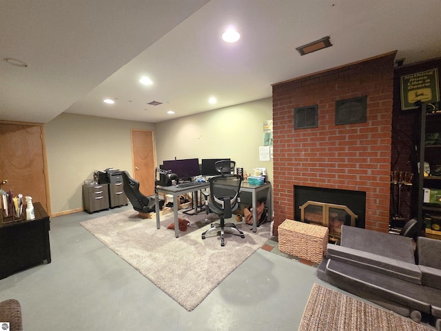 902 S Crapo St, Mount Pleasant, MI 48858 - office area with finished concrete flooring, recessed lighting, and a fireplace