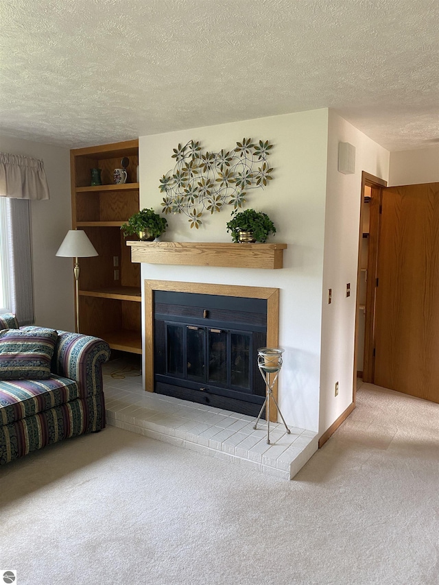 2679 Green Meadows Dr Unit 8, Traverse City, MI 49686 - living room with carpet floors, a brick fireplace, and a textured ceiling