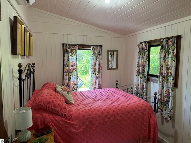 8489 S Glen Lake Rd, Glen Arbor, MI 49636 - bedroom featuring lofted ceiling, wood ceiling, and wooden walls